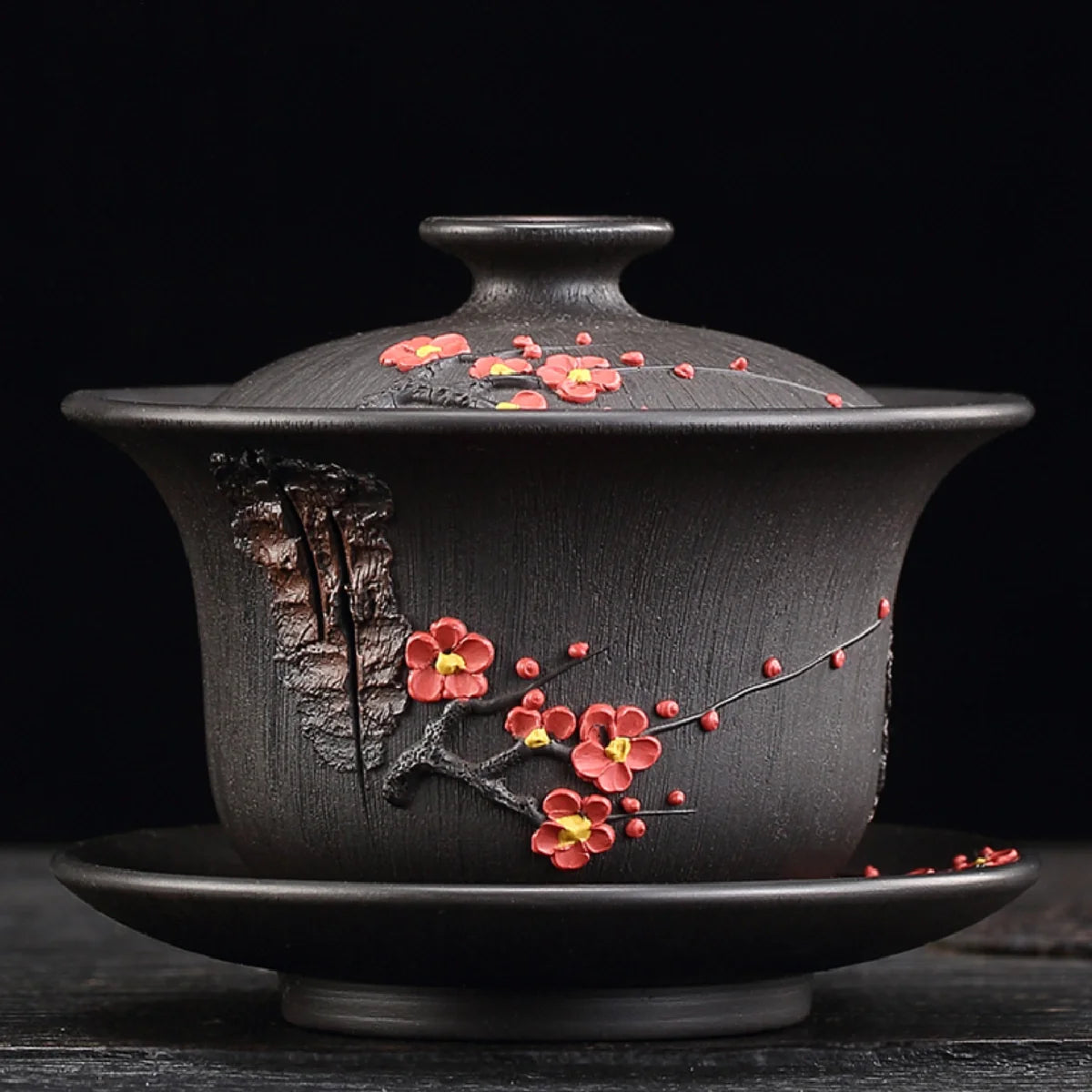 Jianshui plum blossom black clay gaiwan